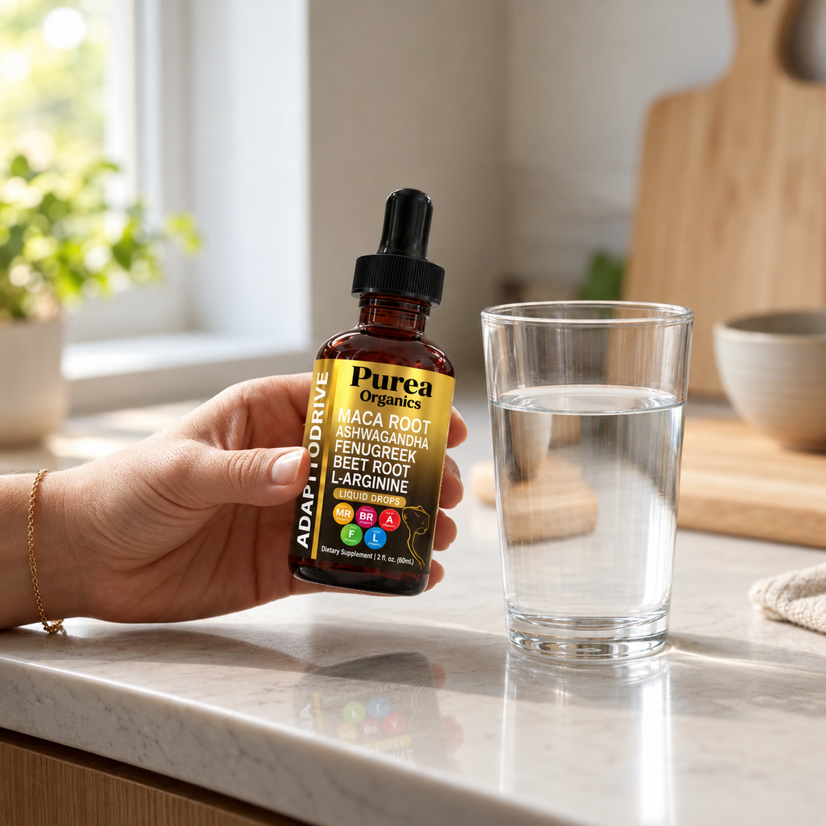 Hand holding the Purea Organics bottle beside a glass of water